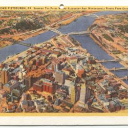Color postcard of downtown Pittsburgh and rivers intersecting