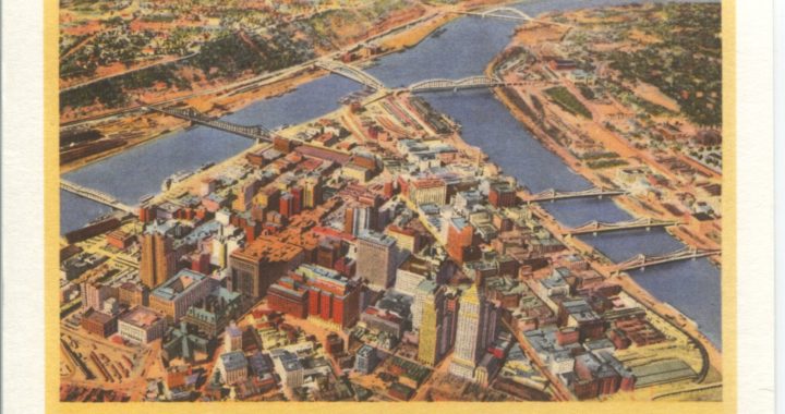 Color postcard of downtown Pittsburgh and rivers intersecting