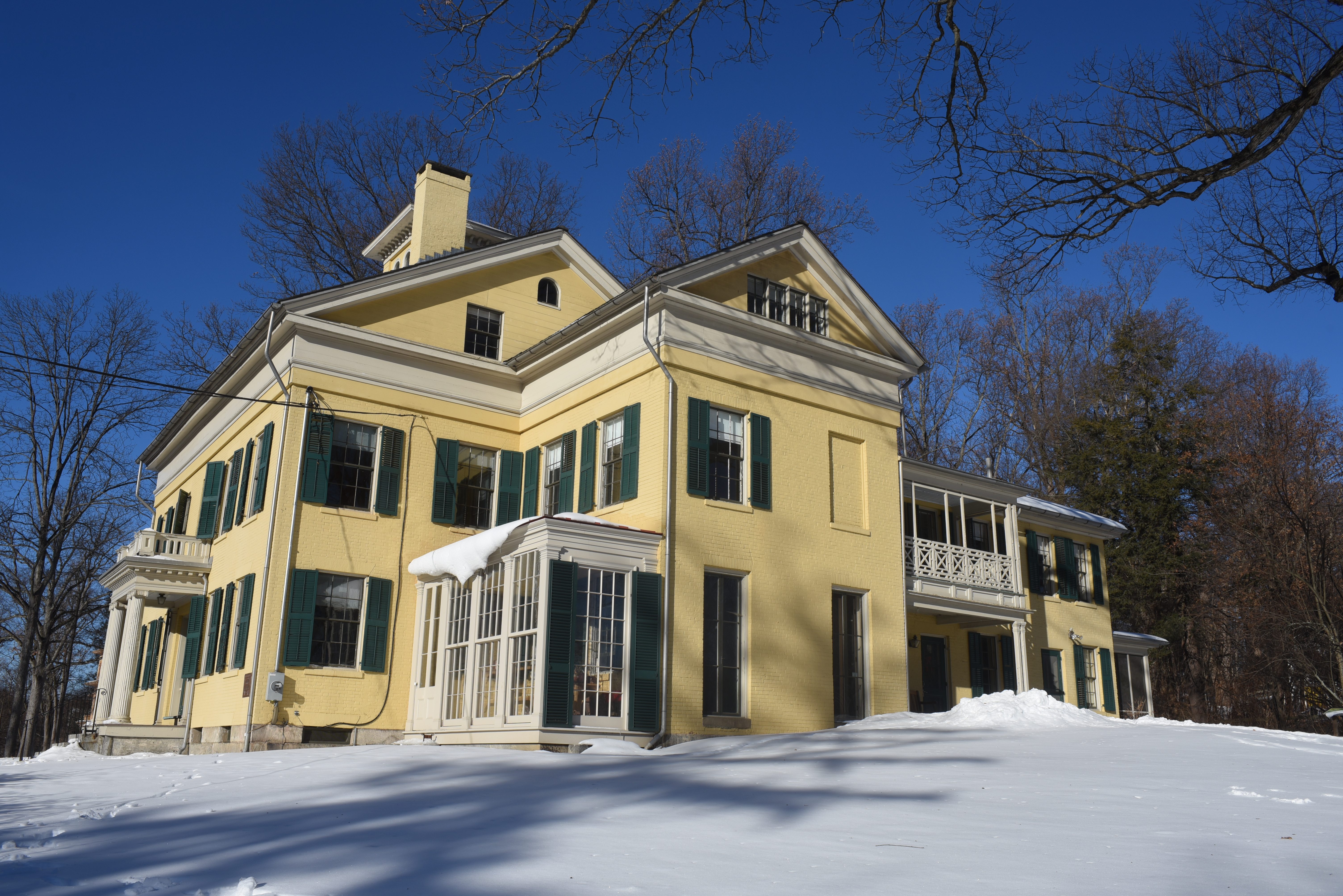 The Emily Dickinson Museum in winter, with snow on the ground