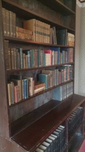 A bookshelf in the Homestead library