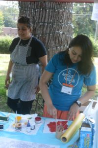 Folks doing crafts at the Amherst Poetry Festival