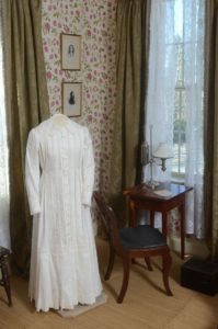 Emily's Iconic white dress on display in her room today