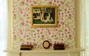 Emily Dickinson's bedroom wall with restored wallpaper