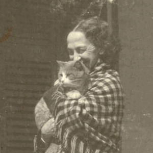 Lavinia Dickinson holding a cat