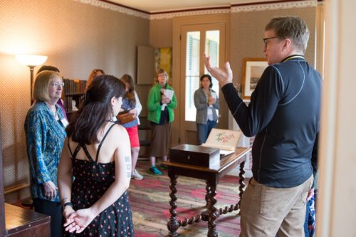 Group of teachers on a guided tour of the Dickinson library.