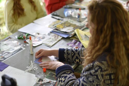 A workshop participant prepared to create her collage poem.