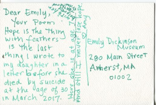 Postcard verso with inscription in green ink