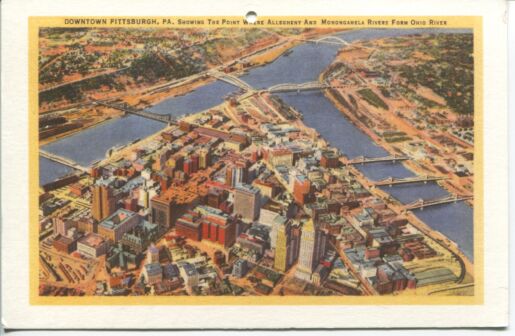 Color postcard of downtown Pittsburgh and rivers intersecting