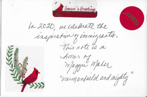Postcard face featuring a handwritten inscription in black ink and several stickers featuring cardinals