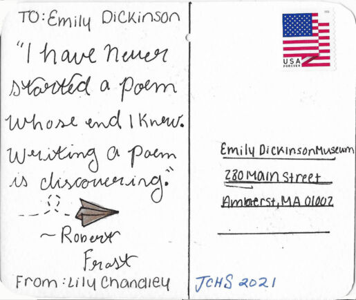 Postcard verso featuring a handwritten inscription in black ink