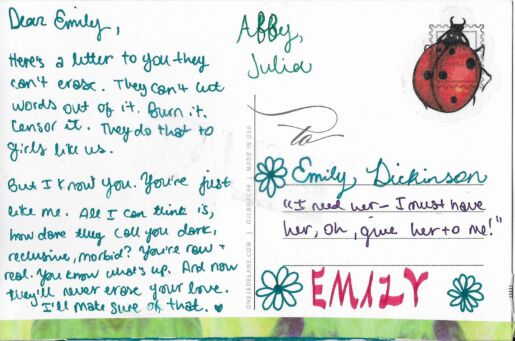 Postcard verso with a handwritten inscription in green ink