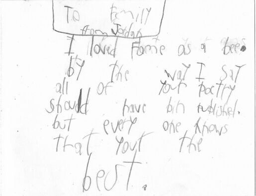 Postcard verso featuring a handwritten inscription in pencil