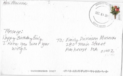 Postcard verso featuring a handwritten inscription in pencil