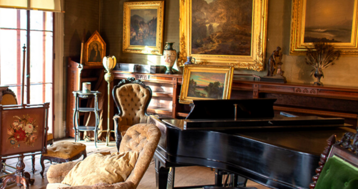 The Evergreens parlor filled with Dickinson family objects including furniture, paintings, instruments and more