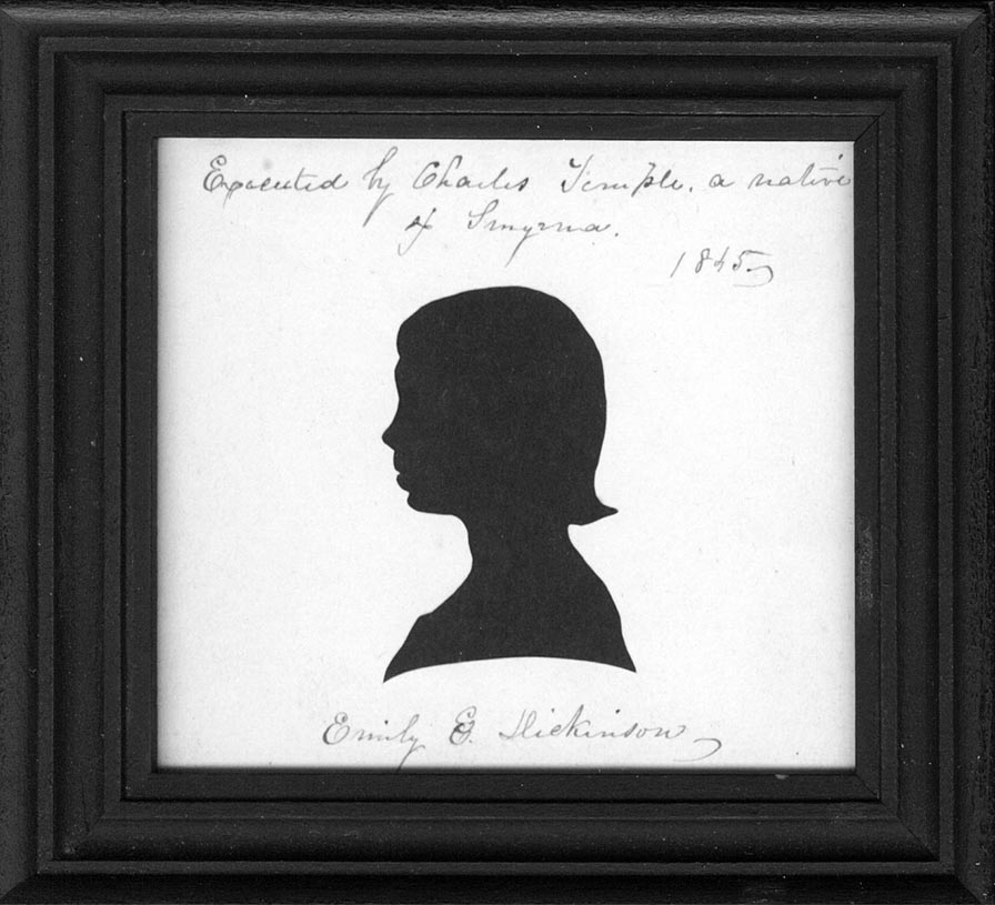 Black-framed cut silhouette of girl with bobbed hair, facing left. “Emily E. Dickinson” is written below in script.